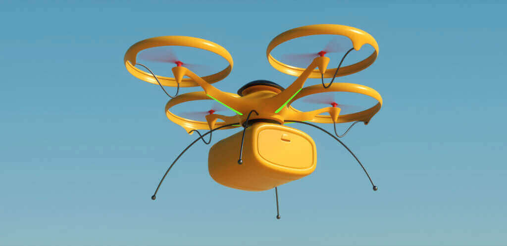 Yellow Drone Flying On Blue Sky