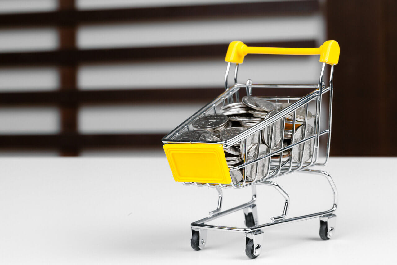 shopping cart with coins