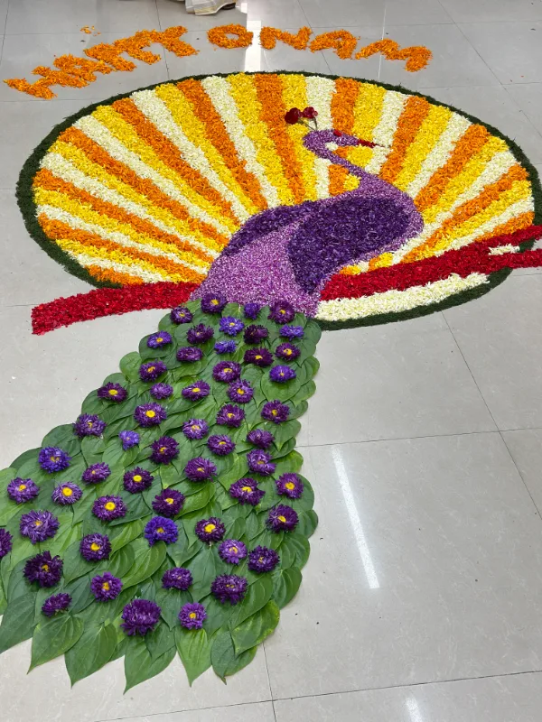 Peacock Styled Pookkalam of Onam 2024